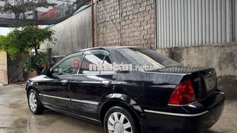 Ford laser bản GhiA sx 2004 vip chính chủ .