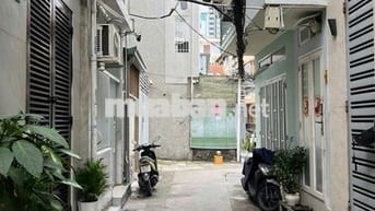 4 Tầng  Nhà Quận 1 - đối diện sân vận động hoa lưu