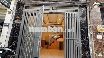 Bán nhà ngay Đ. Quốc lộ 50, 1 trệt, 1 lầu. Giá 1 tỷ 325 triệu, Sổ sẵn.