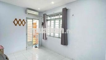 Phòng trọ 15m2 đường Nơ Trang Long đầy đủ máy lạnh tủ lạnh