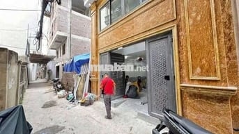 Tôi cần bán nhà mặt ngõ Lê Quang Đạo 7tầng thang máy full nội thất.