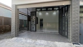 Bán căn nhà rất đẹp 90m2 đường nhựa ở Hóc môn giá 730 triệu.sổ riêng