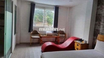 bán gấp toà nhà kd căn hộ dịch vụ khu trung sơn