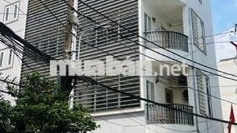 TOÀ NHÀ ỐP KÍNH GÓC 2 MẶT TIỀN NGUYỄN VĂN NGUYỄN, TÂN ĐỊNH, QUẬN 1