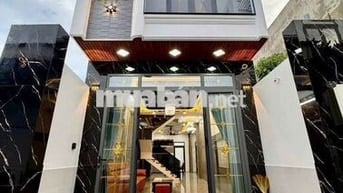 Nhà 1 triệt, 2 lầu, sân thượng,3p,4wc, phòng thờ