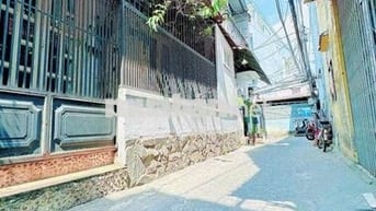 Nhà giá rẻ sau lưng căn Mặt tiền đường sổ hồng riêng hoàn công đủ