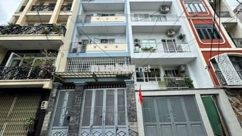 Bán nhà , Ngay Emart Phan Văn Trị, P5, Ngang 5m, 6 Tầng, Thang máy.
