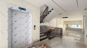 NHÀ  4 TẦNG CÓ THANG MÁY ĐƯỜNG THÍCH QUẢNG ĐỨC GIÁ 42 TRIỆU/THÁNG