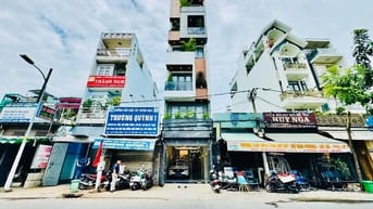 Bán nhà mặt tiền đẹp 5 tầng 549A Tân Sơn P12 Gò Vấp (THANG MÁY 650kg