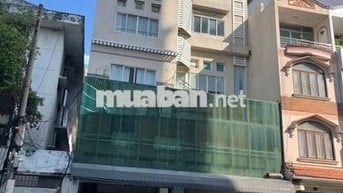 Tòa nhà 2 hầm 6 tầng có thang máy, MT Nguyễn Đình Chính 90tr/tháng