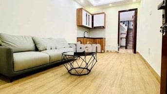 Bán nhà tập thể phố Lê Gia Định oto đỗ cửa nhà đẹp 2 thoáng ở ngay 80m