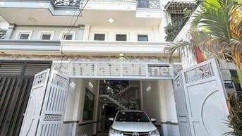 Nhà 3 lầu Lâm Thị Hố Q12 ngay trường học Việt Âu. Có garage xe.