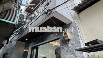 Nhà mới keng trệt 2 lầu đúc BTCT Lạc Long Quân P11 TB