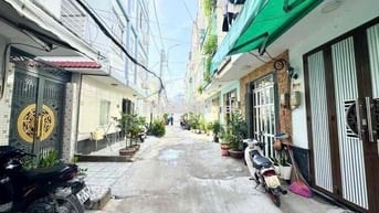 BÁN NHÀ ĐỒNG SỞ HỮU HUỲNH TẤN PHÁT NHÀ MỚI ĐẸP 3 TẦNG SÂN ĐỂ XE RỘNG