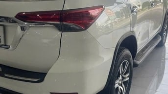 Bán Fortuner nhập màu trắng máy dầu số tự động.