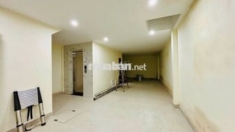 Nhà nguyên căn 7 tầng đường Ngõ Trần Xuân Soạn rộng vừa ô tô