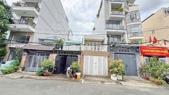 BÁN NHÀ MẶT TIỀN 4m X 21m CƯ XÁ NGÂN HÀNG QUẬN 7