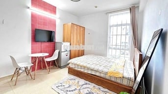 Cho thuê Phòng 30m2 full nội thất ban công đường Phan Chu Trinh gần Q1