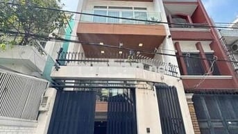 BÁN NHÀ HẺM 120 THÍCH QUẢNG ĐỨC, P4, PHÚ NHUẬN – 6 TẦNG GARA ÔTÔ