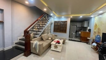 Nhà hẻm xe hơi DT5x10m,2 tầng sát Nguyễn Hữu Thọ.lh chú Chỉn0931432374