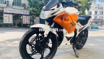 Xe máy màu Trắng Cam, chất liệu Kim loại Nhựa