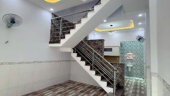 Bán nhà Hóc Môn 4 x 12 đúc trệt lầu 2PN, ngay sân banh Thới Tứ