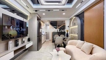Hẽm xe hơi Đường Nguyễn Ảnh Thủ Quận 12 68m2 5ty2 3 lầu 4PN 5WC.