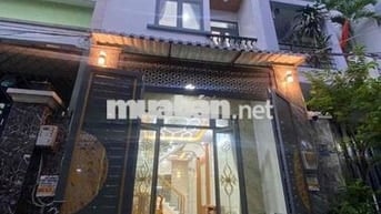 Nhà mới y hình gần chợ siêu thị