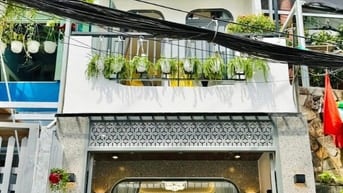 Bán nhà mới mặt tiền kinh doanh- Gần Công Viên Gia Định