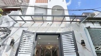 Giá rẻ chỉ: 8,3 tỷ Đẹp như mơ. HXH. 4 tầng. Sát Tân Hương. Dt: 4 x 18.