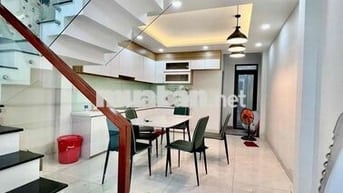 Nhà Mới Sạch Sẻ DT 200m2 1Trệt 2Lầu 4Pn 4Wc Sân Xe Máy Hẻm Xe Tải