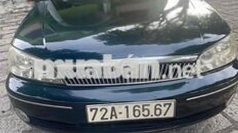 Ford Laser 2003 Ghia 1.8 - 180000 km