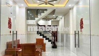 nhà mặt tiền gần Siêu Thị Go,gần chợ Dĩ An 1,có nội thất.sân xe hơi