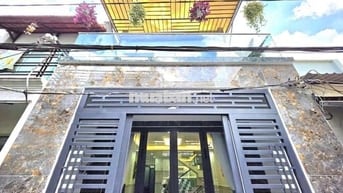 Nhà đẹp vào ở liền đường xe hơi gần Phú Mỹ Hưng quận 7