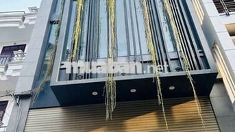 TÒA NHÀ ĐƯỜNG NGUYỄN VĂN TRỖI DIỆN TÍCH: 6X20M HẦM 5 TẦNG CHO THUÊ