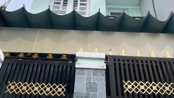 BÁN NHÀ ,hẻm 1283 ,htp .Q7- dt- 4x17.5 đúc 2 tầng ốp máy ,