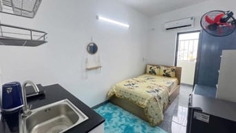 choThuê căn hộ mini 1 khách ở  có bếp nấu ăn, ban công,máy gặt riêng, 
