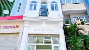 NHÀ 3,5LẦU MT ĐƯỜNG TRẦN HƯNG ĐẠO , PTT , QUẬN TÂN PHÚ