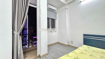 PHÒNG BAN CÔNG NGAY MẶT TIỀN TRẦN QUANG KHẢI QUẬN 1