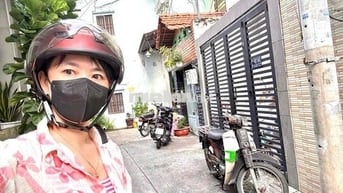Bán nhà cách 3 căn ra mt xe hơi Tôn Thất Thuyết,,Bến vân đồn,.