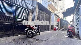 Bán nhà kế bên chợ 200 Đ.xóm chiếu, trục Đ.tôn đản ra Vĩnh Khánh.