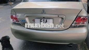 Mitsubishi Lancer 2003 Vàng cát