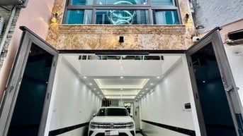 Bán Nhà Ô Tô Trong Nhà, Hoàng Đạo Thành, TX 42m, 8 tầng, giá 20.5 tỷ