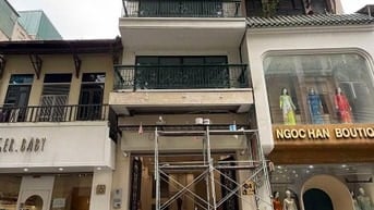 Cho thuê nhà mới xây,7 tầng, có thang máy mặt phố số 4 Mai Hắc Đế