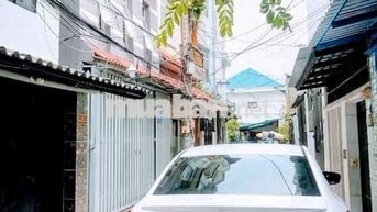 GẤP BÁN ĐỊNH CƯ MỸ- HTP QUẬN 7 - HXH - 3 TẦNG -  SHR- CHỈ 6,X TỶ