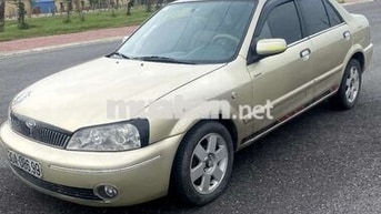 Ford Laser Vàng cát Số sàn