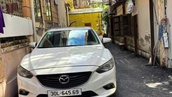 Chính chủ bán xe Mazda 6, màu trắng, sản xuất cuối năm 2014, ĐK 2015