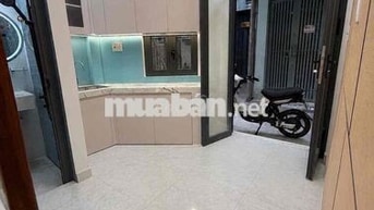 Nhà mới , Trệt lầu lửng , sd 30m2 , Trước nhà 3m , Q4.