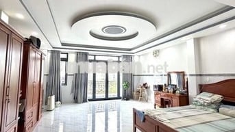 BÁN NHÀ GÒ DẦU 5 TẦNG ĐẸP GIÁP VỚI MẶT TIỀN ĐƯỜNG