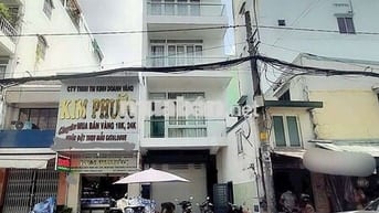 nhà mặt tiền bà hạt, q.10. dt. 5x19m 1 trệt 4 lầu st. thang máy